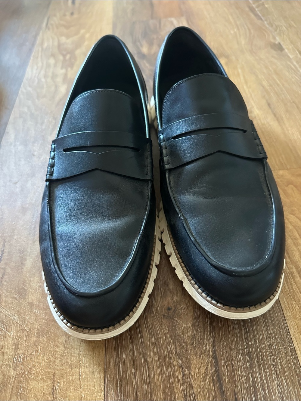 Cole Haan Black Leather ZEROgrand Penny Loafers with White Soles